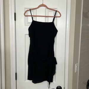 Little black dress from princess polly. Wrap around dress ties in the front.